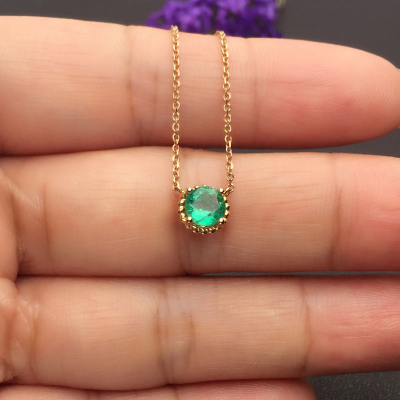 红18K金祖母绿链牌0.690克拉