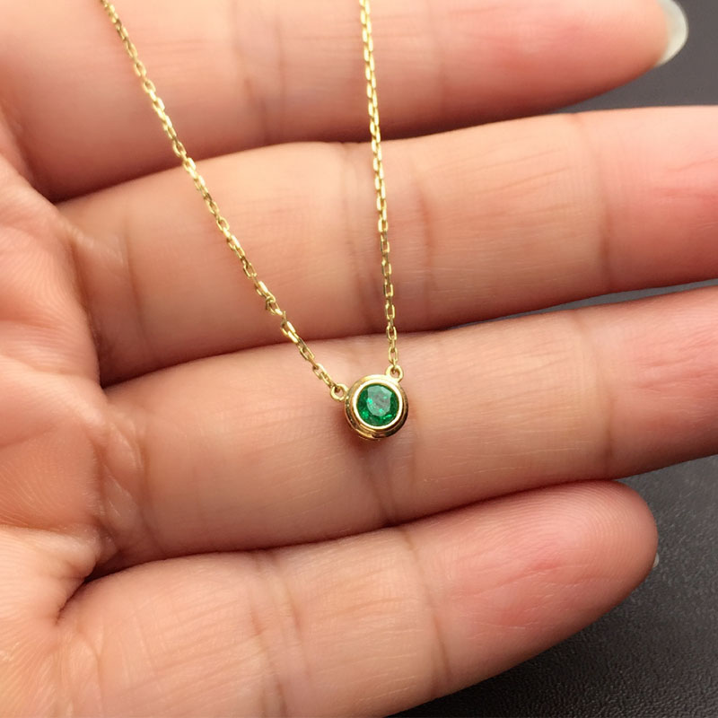 黄18K金祖母绿链牌0.672克拉