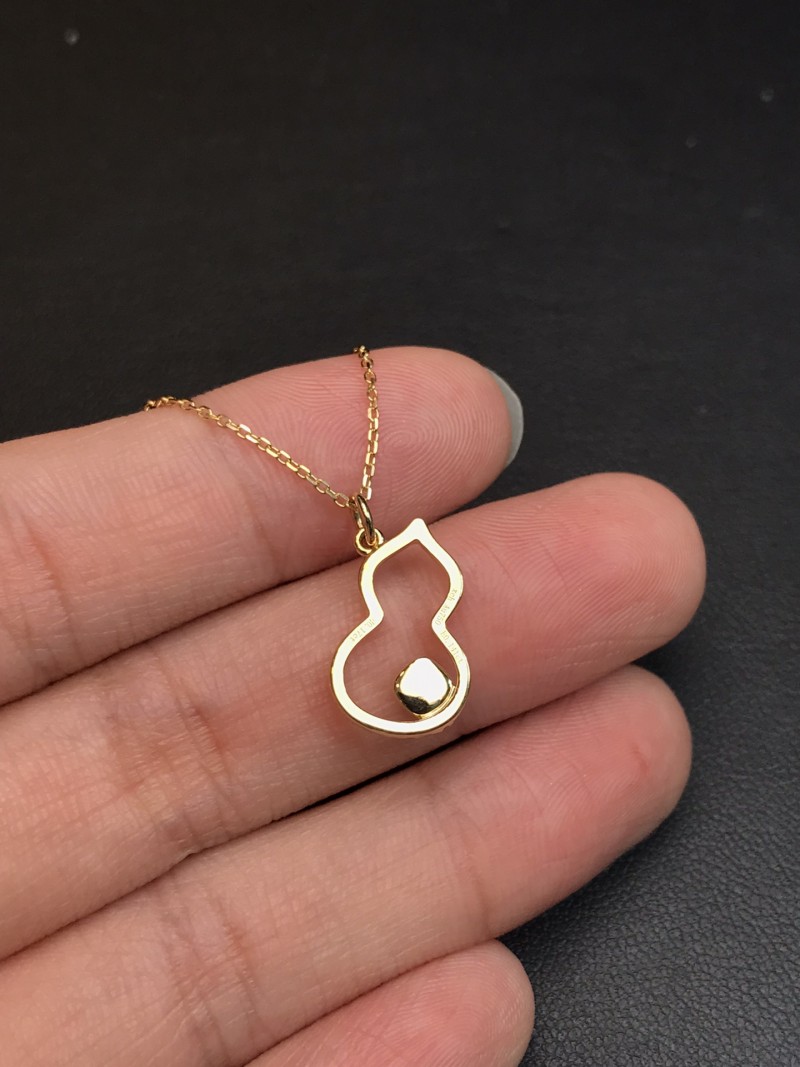 阿富汗黄18K金祖母绿吊坠0.141ct